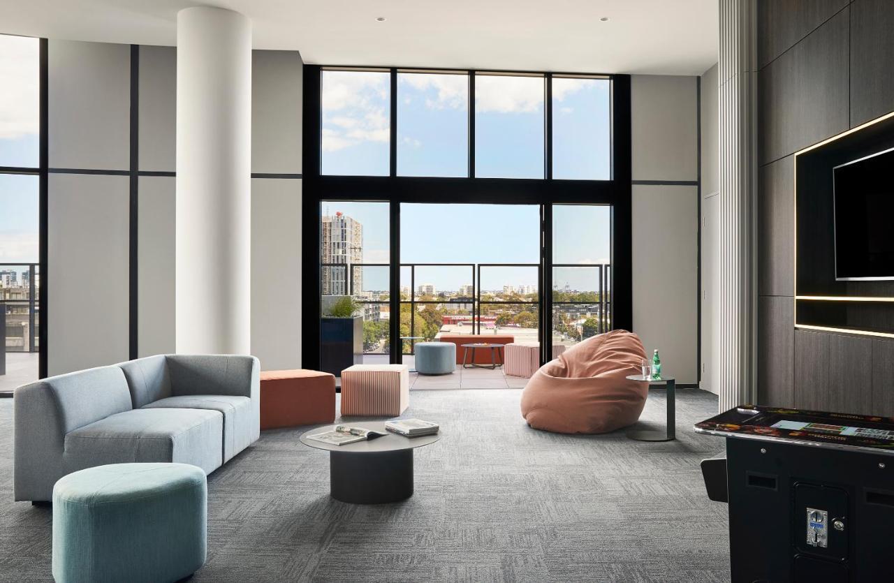 Aparthotel Oakwood Premier Melbourne Exteriér fotografie The common room at the new residence hall