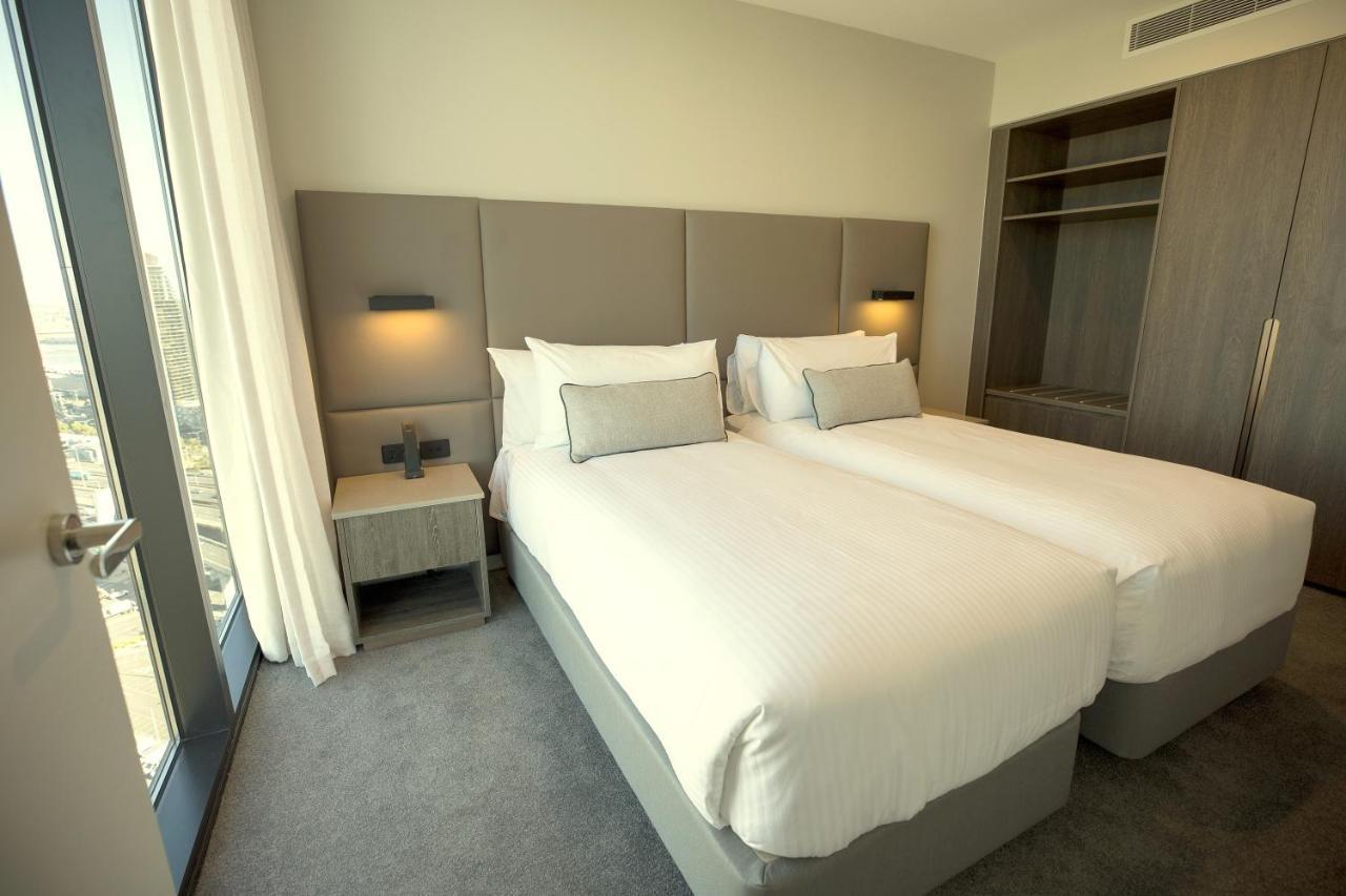 Aparthotel Oakwood Premier Melbourne Exteriér fotografie A bedroom at the hotel